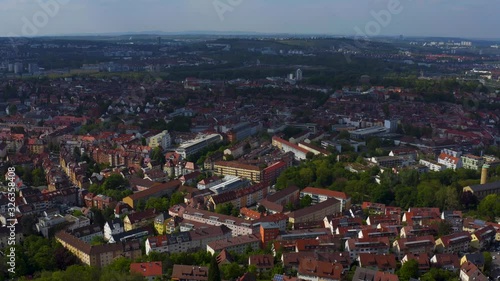 Aerial around the Gaisburg hill in spring  in Stuttgart, Germany. Pan to the right across Stuttgart. photo