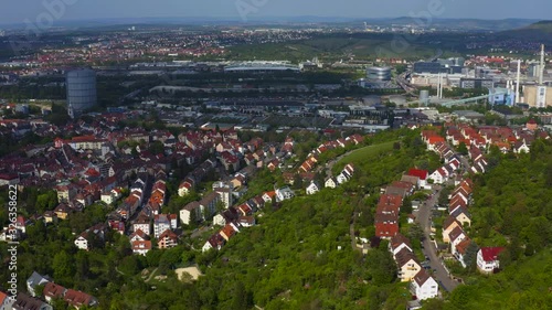 Aerial around the Gaisburg hill in spring  in Stuttgart, Germany. Pan to the left across Stuttgart. photo