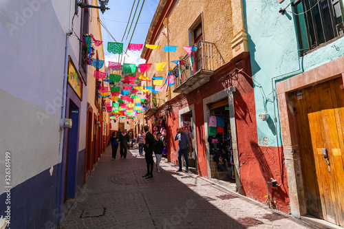 Colored colonial houses in old town of Guanajuato. Colorful alleys and narrow streets in Guanajuato city, Mexico. Spanish Colonial Style. © Curioso.Photography