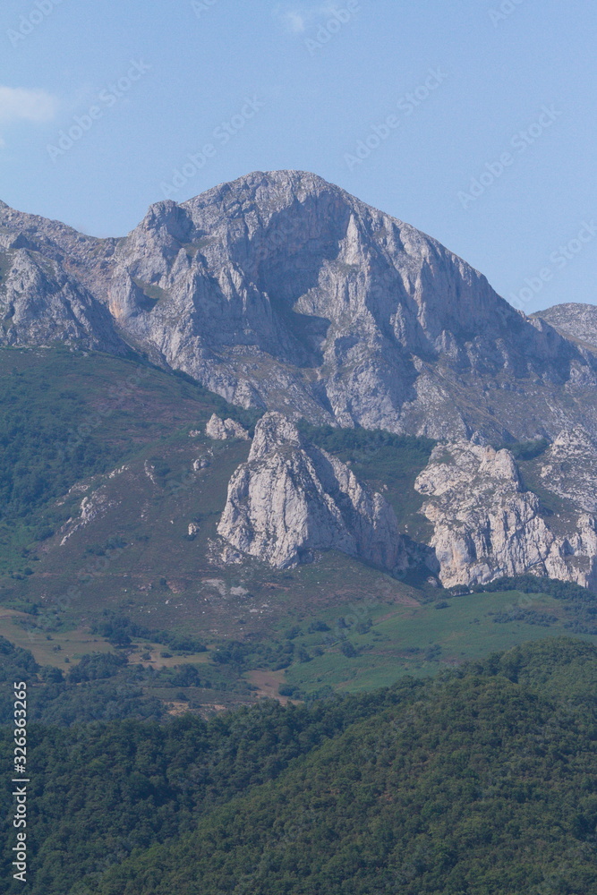 Potes, Cantabria/Spain; Aug. 03, 2015. The first peaks of Picos de Europa in Potes.