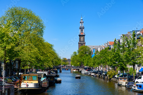 Photography Buildings and boats along the canal in Amsterdam, Netherlands