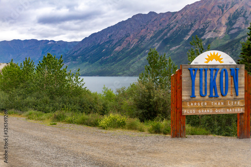 Yukon state entry sign near Tagish lake, Canada photo