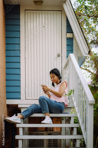 Young asian woman in casual...