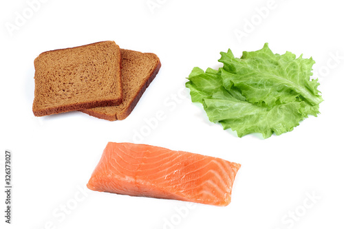 Ingredients for making sandwich. Salmon, fresh vegetables, bread,. Isolated on white background,