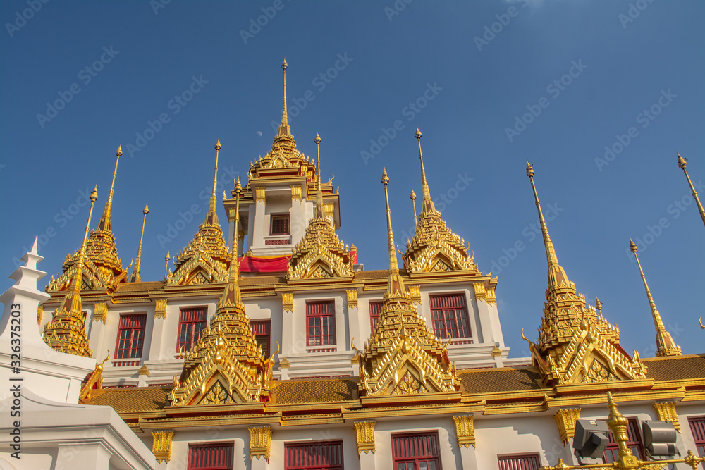The place named Loha Prasat in Wat Ratchanatdaram in Bangkok Thailand which means iron castle or monastery that the center tower contained large black iron spires.