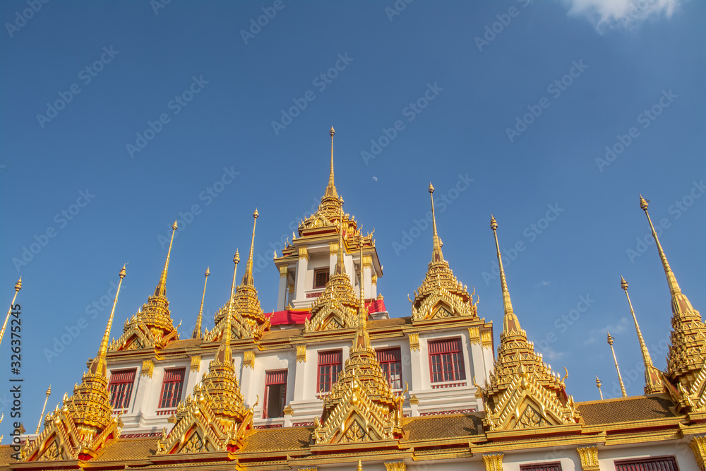 Fototapeta premium The place named Loha Prasat in Wat Ratchanatdaram in Bangkok Thailand which means iron castle or monastery that the center tower contained large black iron spires.