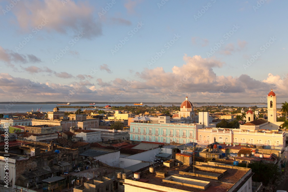Aerial view of the historic town center with dome of government building and church towers seen at sunrise, Cienfuegos, Cuba