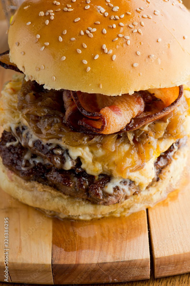 Bacon Cheeseburger with swiss cheese. open faced burger. Traditional