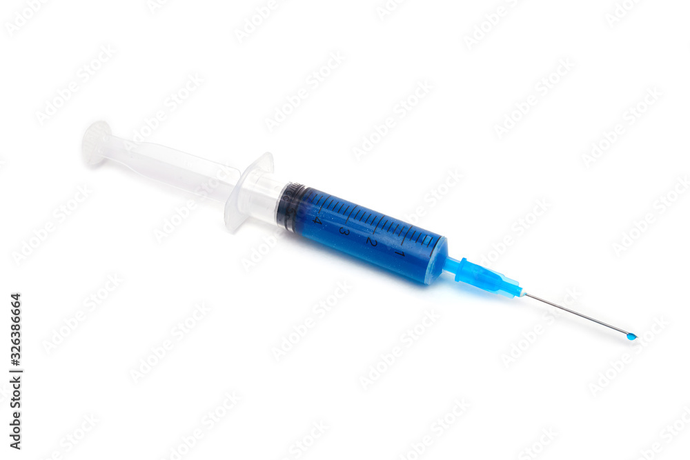 syringe with blue liquids isolated on white syringe with blue liquids isolated on white