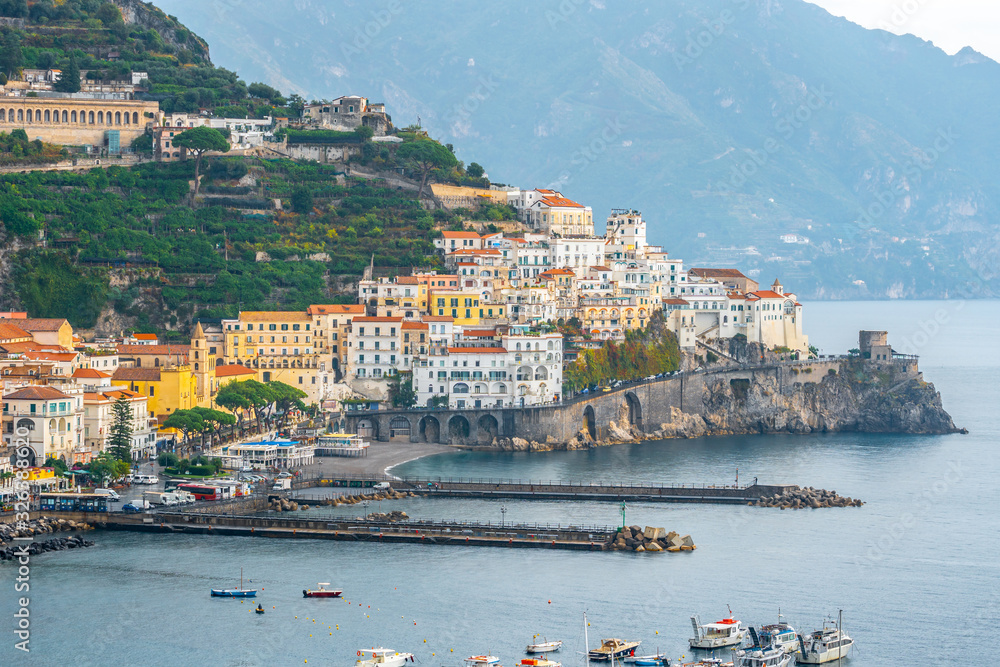 Amalfi cityscape on coast line of mediterranean sea, Italy Amalfi cityscape on coast line of mediterranean sea, Italy