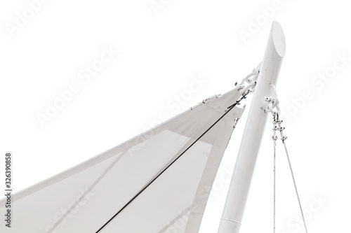 Corner of a white awning in sail shape isolated