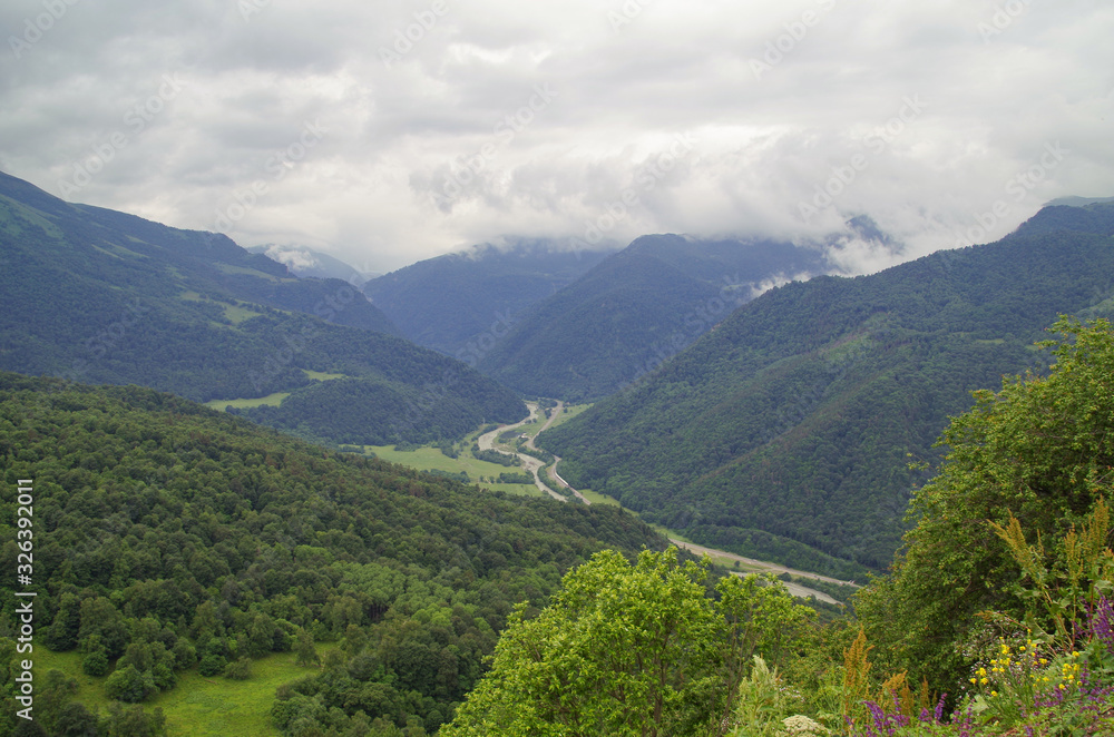 Scenic view of valley of the river after rain. Nature and travel. Russia, North Caucasus, Karachay-Cherkessia, Arkhyz