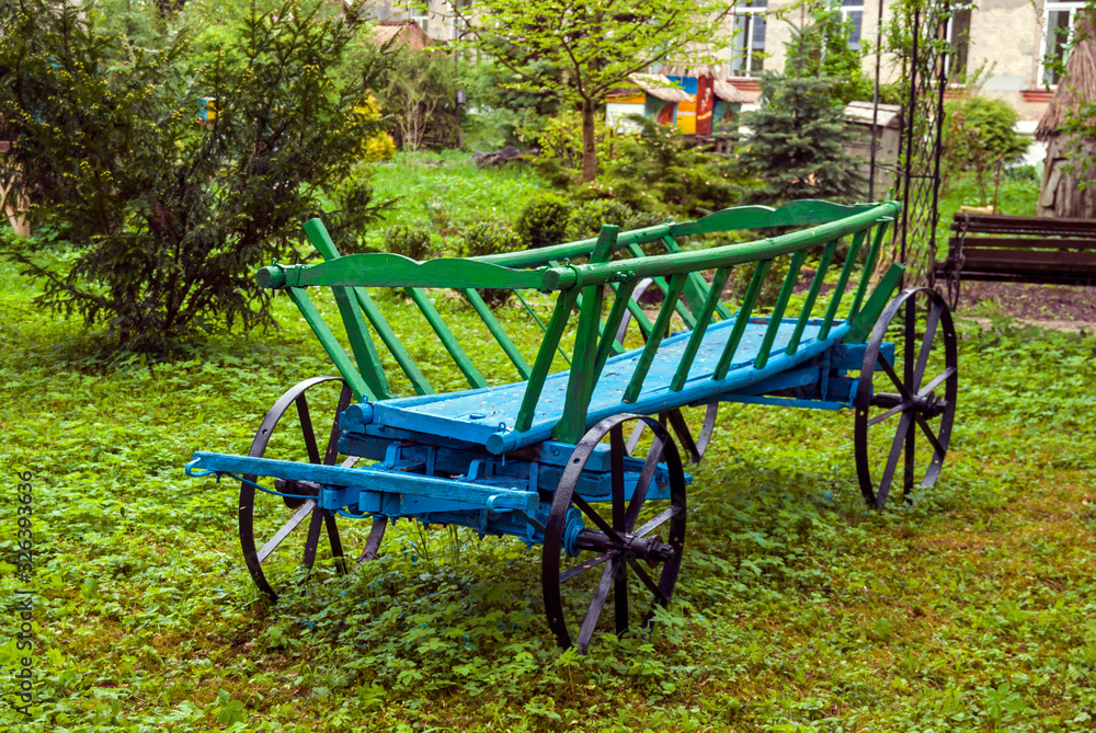 Decorative horse carriage for garden design.
