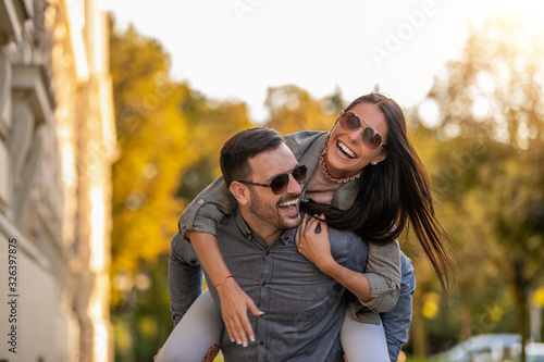 Smiling people spending time together outdoors