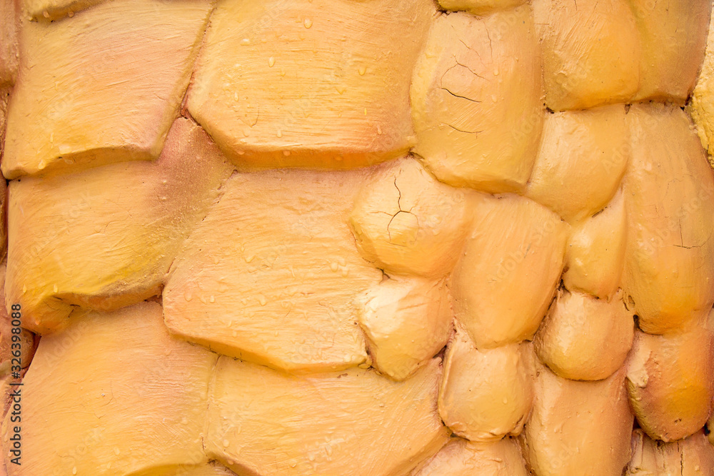 The stone surface is coated with orange. The stone surface is coated with orange.