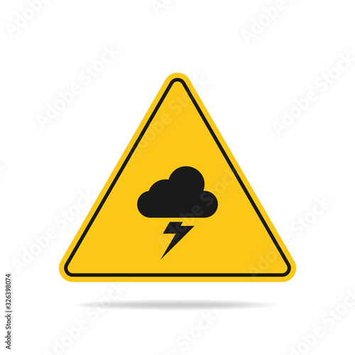 The triangular warning sign of a thunderstorm threat with lightning and cloud symbols is isolated on a white background.