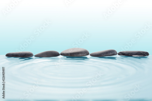 zen stone on the water with copy space for your text