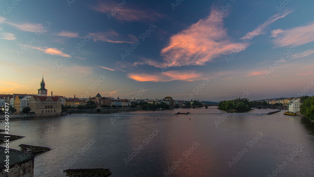View from Charles Bridge in Prague before the sunrise night to day timelapse, Bohemia, Czech Republic.
