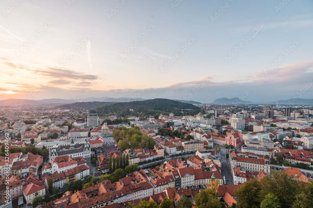 Fototapeta premium Aerial view of the sunset cityscape in Ljubljana, Slovenia