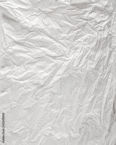 white sheet of paper battered with texture