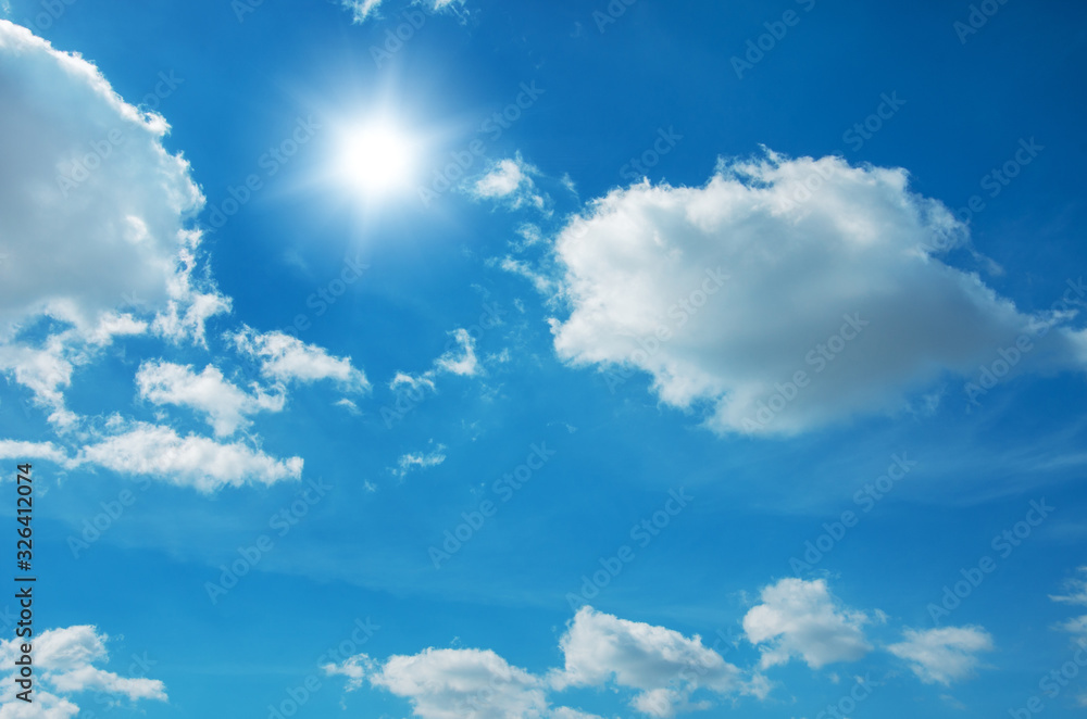 Blue sky with clouds and sun. Blue sky with clouds and sun.
