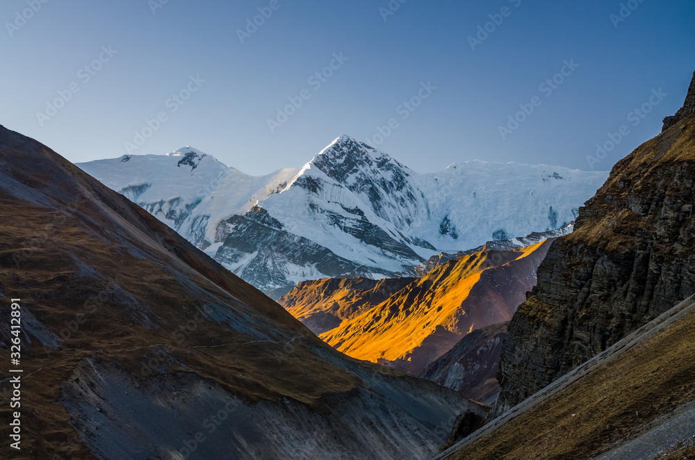 Mt. Gangapurna at sunrise. View from Thorung Phedi. Annapurna circuit trek, Nepal.