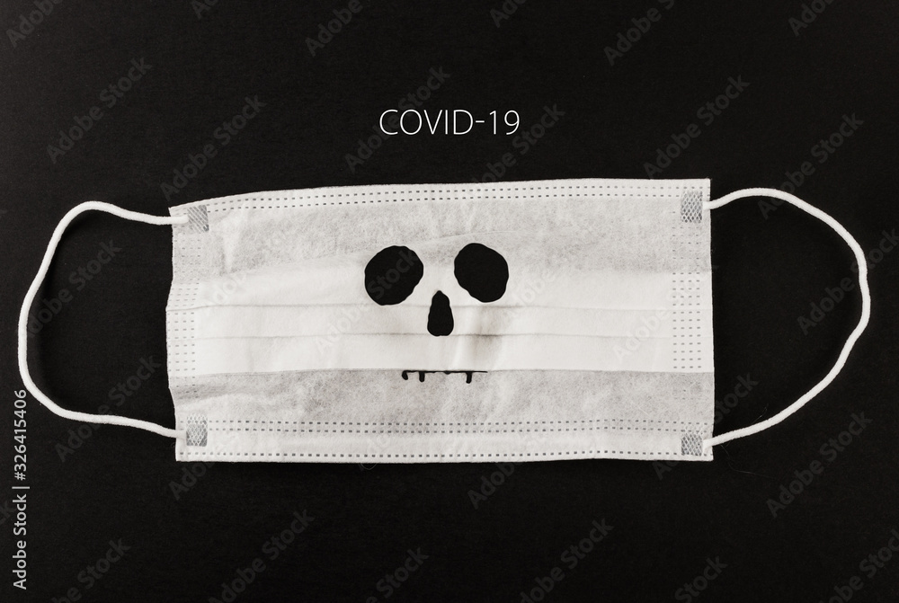 Medical protective mask with Covid-19 text and skull Medical protective mask with Covid-19 text and skull