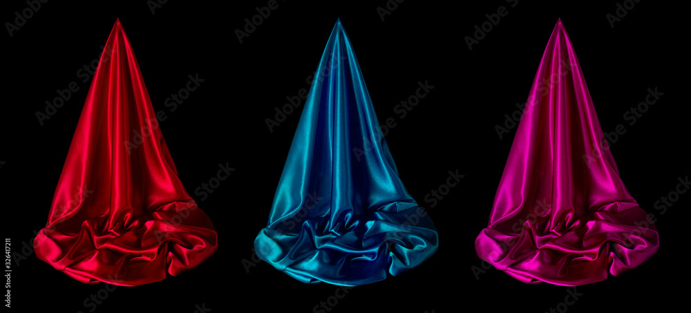 Satin fabric on a black background. Abstract design. Satin fabric on a black background. Abstract design.