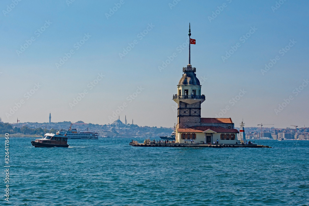 Maiden's Tower, also called Leander's Tower, off the Uskudar coast in Istanbul, Turkey. In the background, Suleymaniye mosque and Sultanahmet, on the left, and Beyoglu on the right