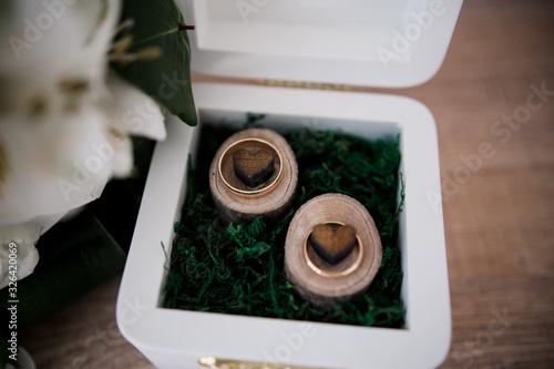wedding rings in a wooden box