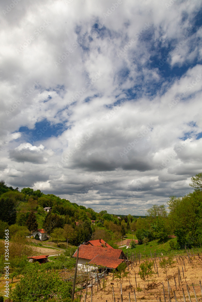 Sunny day with clouds in a rural countryside of Croatian north