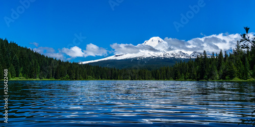 Scenic landscape of Trillium Lake and Mount Hood on a sunny day, early summer or late spring, Oregon, USA. photo