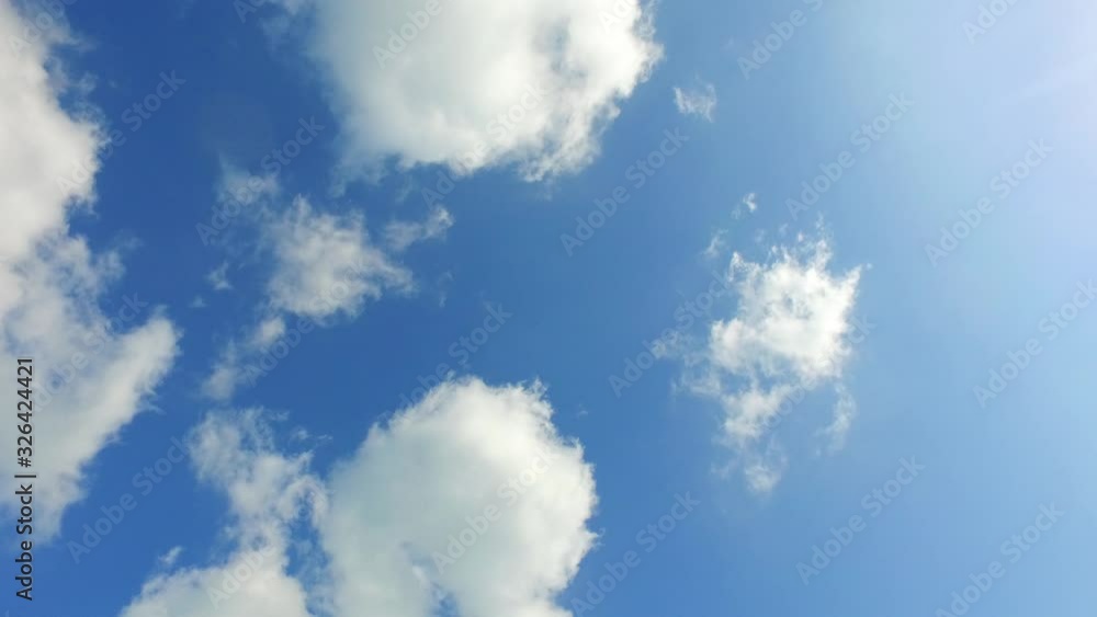 Peaceful heaven with frozen beautiful white clouds on glowing blue sky seen on hot summer day, copy space texture Peaceful heaven with frozen beautiful white clouds on glowing blue sky seen on hot summer day, copy space texture