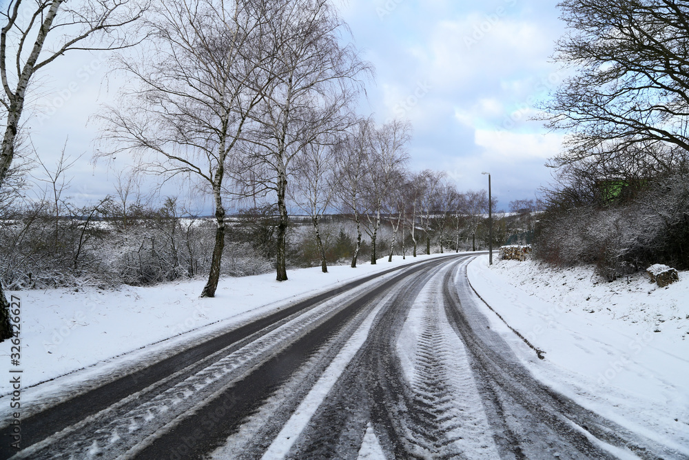 Streets and roads covered with white snow Streets and roads covered with white snow