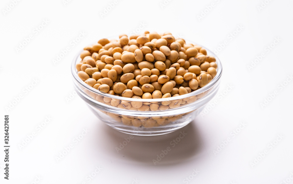 Soybeans in a glass plate on white background Soybeans in a glass plate on white background
