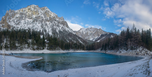 Panoramic view of Green lake (Gruner see) in sunny winter day. Famous tourist destination for walking and trekking in Styria region, Austria