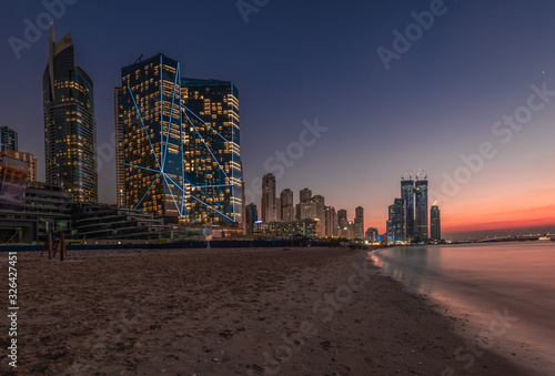 JBR Beach and skyscrapers at sunset photo