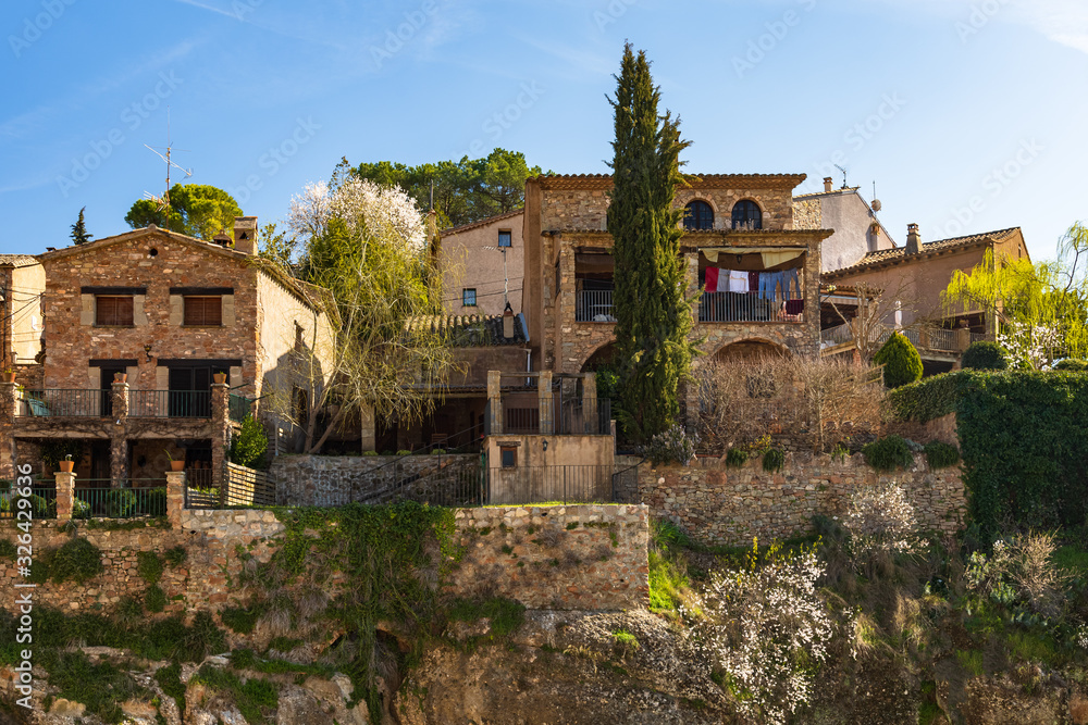 View of the tall houses of the historic center of Mura, Catalonia, Spain