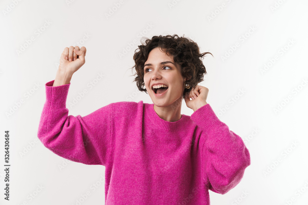 Image of happy beautiful woman smiling and dancing Image of happy beautiful woman smiling and dancing