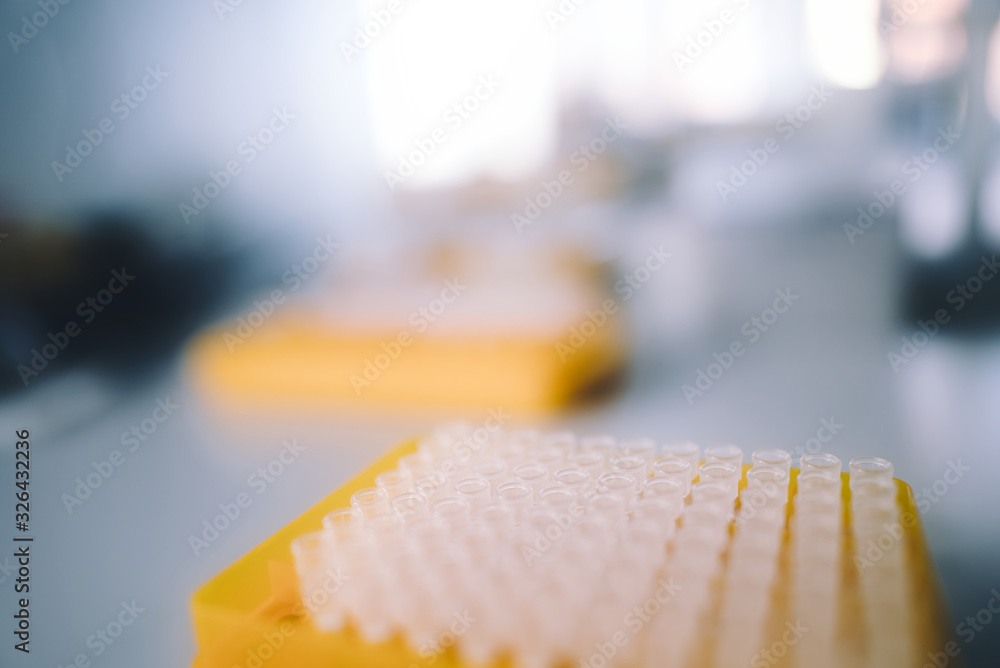Blurry laboratory background with pipette tips Blurry laboratory background with pipette tips