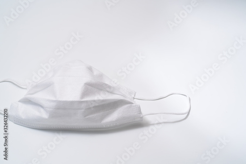 Protective medical mask on white background.