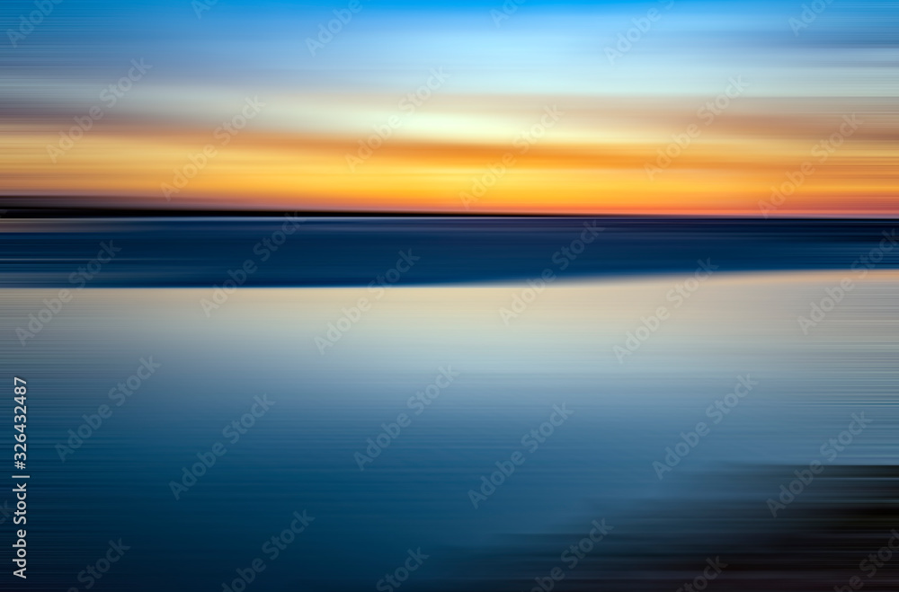 sea and sky in a sunset with contrasting colours sea and sky in a sunset with contrasting colours