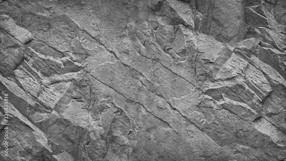 Gray grunge banner. Abstract stone background. The texture of the stone wall. Close-up. Light gray rock backdrop.