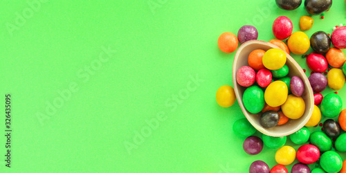 chocolate egg and candy easter decor, menu concept background. top view. copy spaces