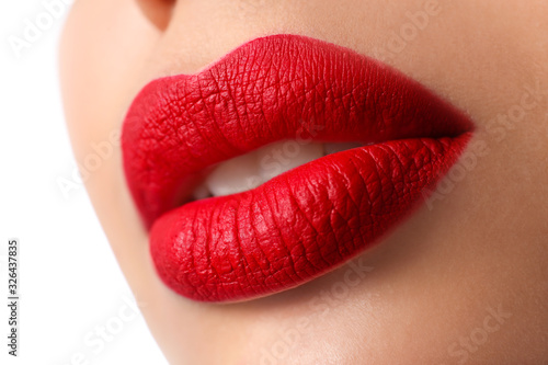 Woman with red lipstick on white background, closeup photo