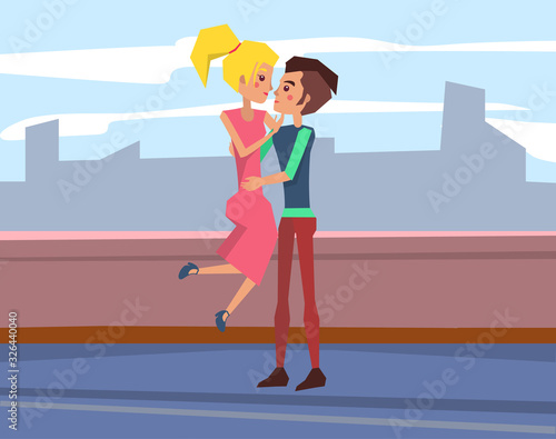 Romantic date on the roof. Loving couple sitting on parapet and hugging. Young people in love kissing. Tender relationships. Boyfriend and girlfriend cuddling
