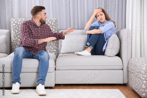 Couple having quarrel at home. Relationship problems