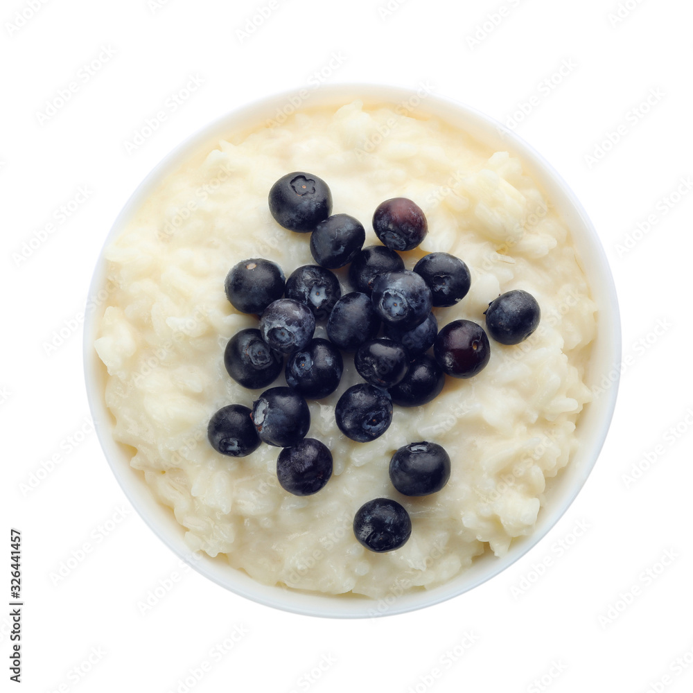 Delicious rice pudding with blueberries isolated on white, top view Delicious rice pudding with blueberries isolated on white, top view