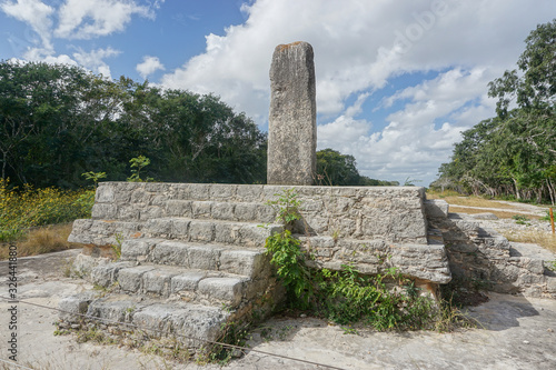 Dzibilchaltun, Yucatan, Mexico: Structure 12, a plain stela on a platform base with stairs on all 4 sides. photo