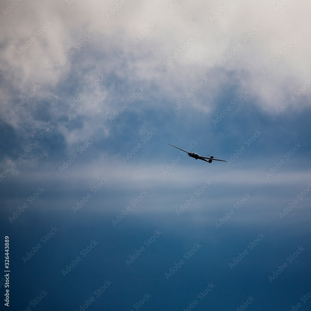 Fototapeta premium Glider high in the blue air